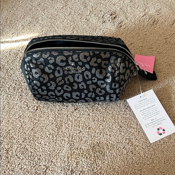 kate spade Handbags - kate spade Black Multi Cosmetic Bag